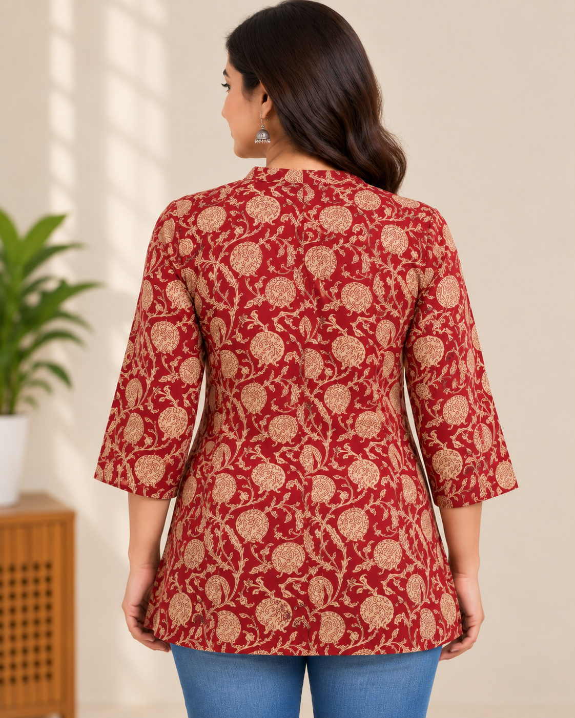 Maroon floral printed cotton short kurti with beige floral vine pattern and three-quarter sleeves