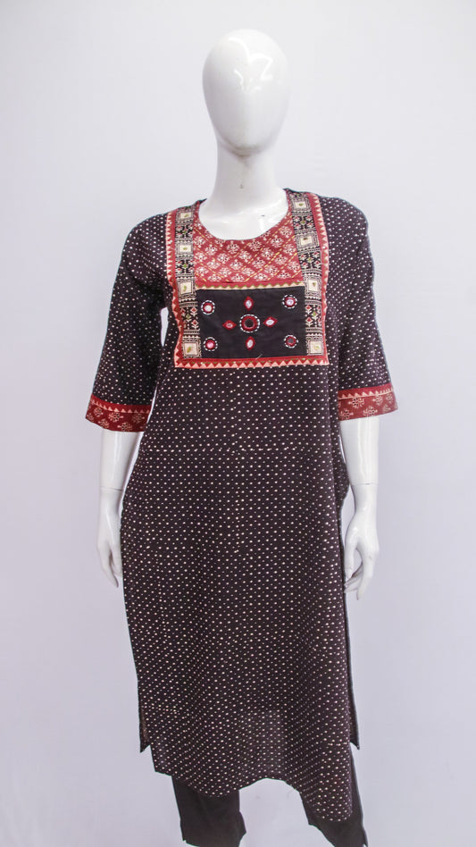 Black patterned kurta with red and white embroidery on a mannequin against a white background