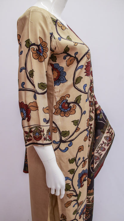 Mannequin wearing a beige floral-patterned scarf with a white background
