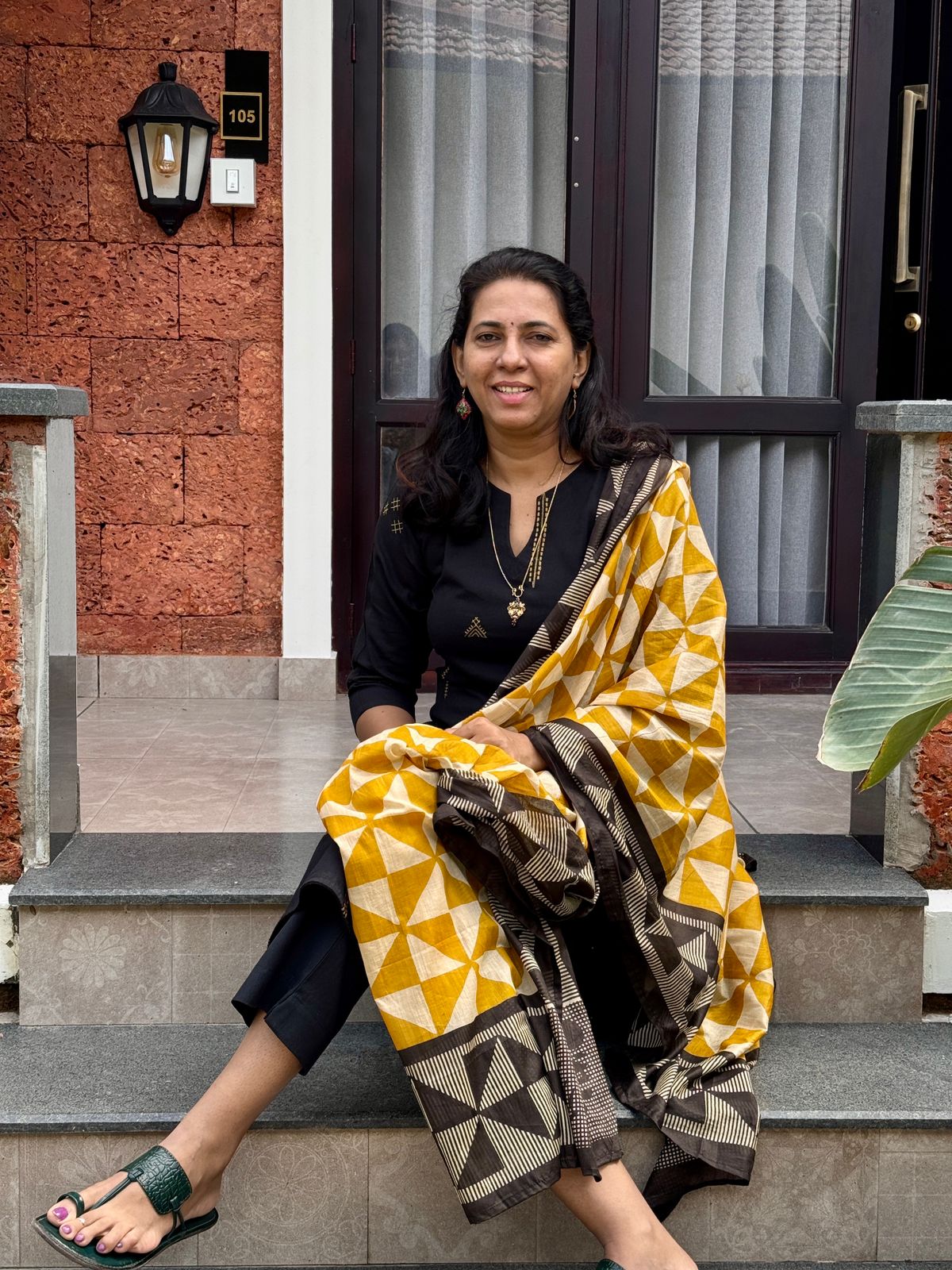 Black cotton printed kurta set with matching dupatta and straight pants for women ethnic wear.
