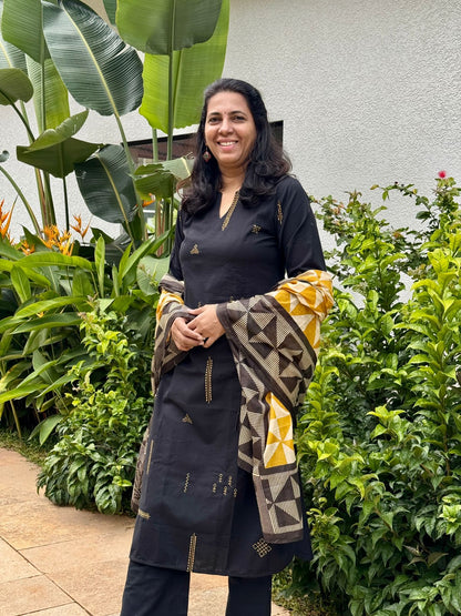 Black cotton printed kurta set with matching dupatta and straight pants for women ethnic wear.