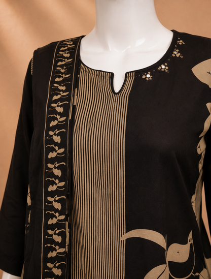 A black and beige printed kurta displayed on a white mannequin torso. The kurta features a split design with vertical beige stripes on the center and a beige floral pattern on the sides, accented with small gold mirror work on the neckline.