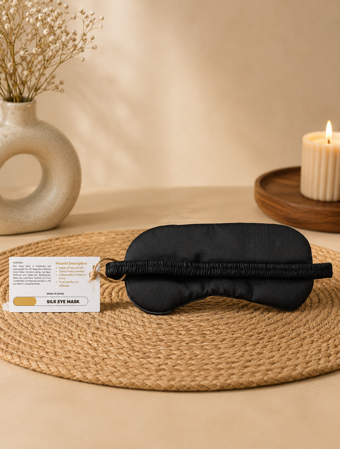Close-up of flexible elastic strap on black premium silk sleep eye mask