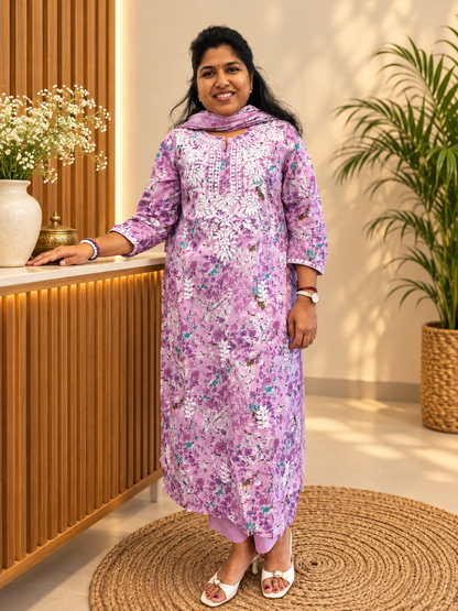 Lavender floral printed Mul Chikankari cotton kurta pant set with embroidered neckline and 3/4 sleeves