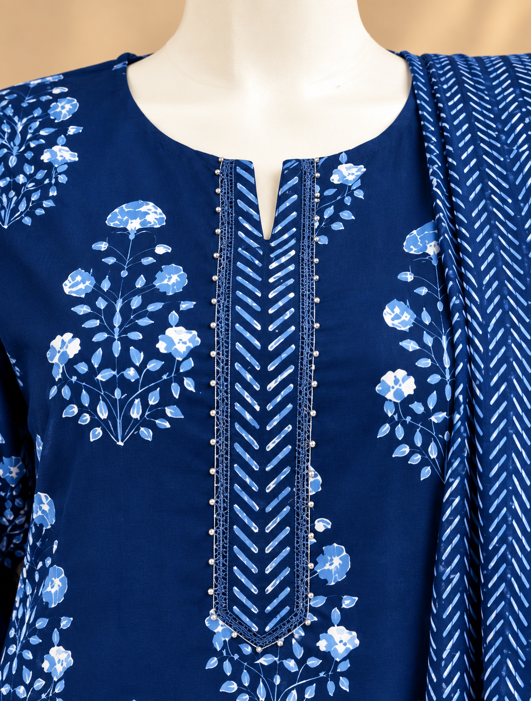 Navy blue floral printed kurta pant set with detailed neckline and matching dupatta