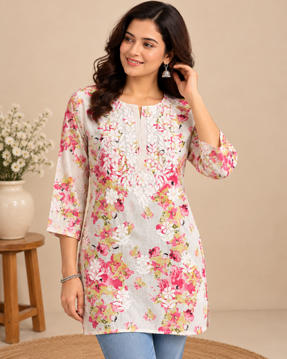 Pink floral printed cotton short top with white floral embroidery and three-quarter sleeves