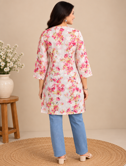 Pink floral printed cotton short top with white floral embroidery and three-quarter sleeves