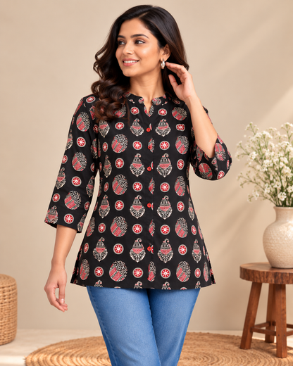 Black short top with red and white traditional printed motifs and 3/4 sleeves