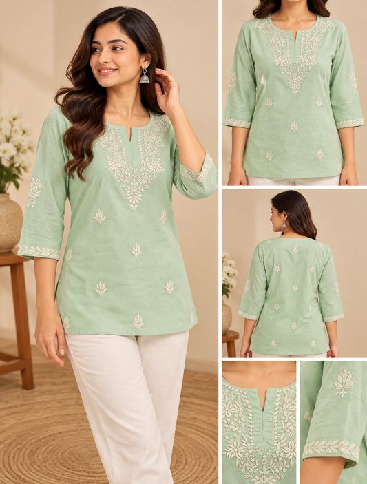  green embroidered short kurti with white floral detailing, three-quarter sleeves and V-notch neckline, shown in right-side profile