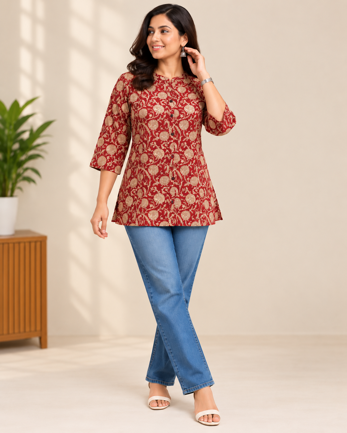 Maroon floral printed cotton short kurti with beige floral vine pattern and three-quarter sleeves