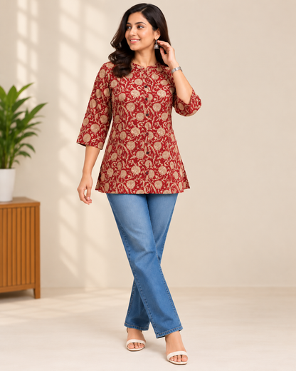 Maroon floral printed cotton short kurti with beige floral vine pattern and three-quarter sleeves