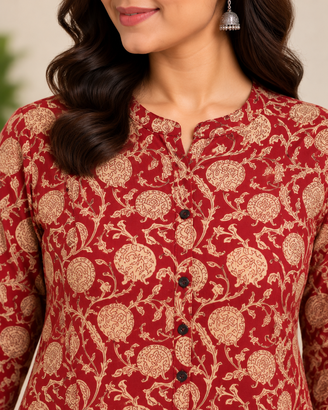 Maroon floral printed cotton short kurti with beige floral vine pattern and three-quarter sleeves