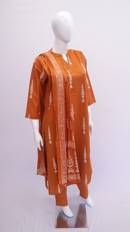 Orange kurta with white patterns on a mannequin against a white background
