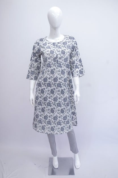 Floral patterned dress on a mannequin against a white background