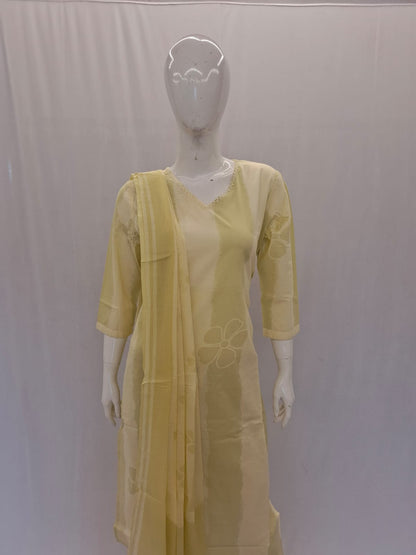 Yellow kurta with a matching dupatta on a mannequin against a plain background