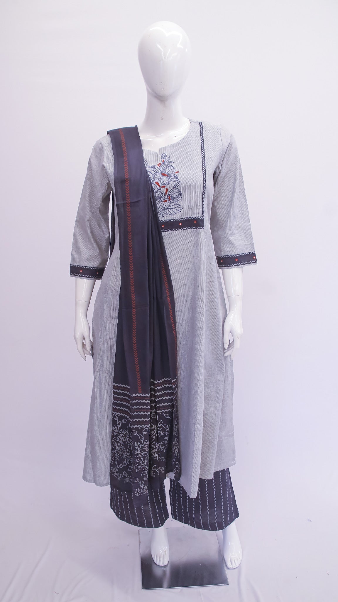 Mannequin wearing a light gray dress with a dark blue dupatta on a white background