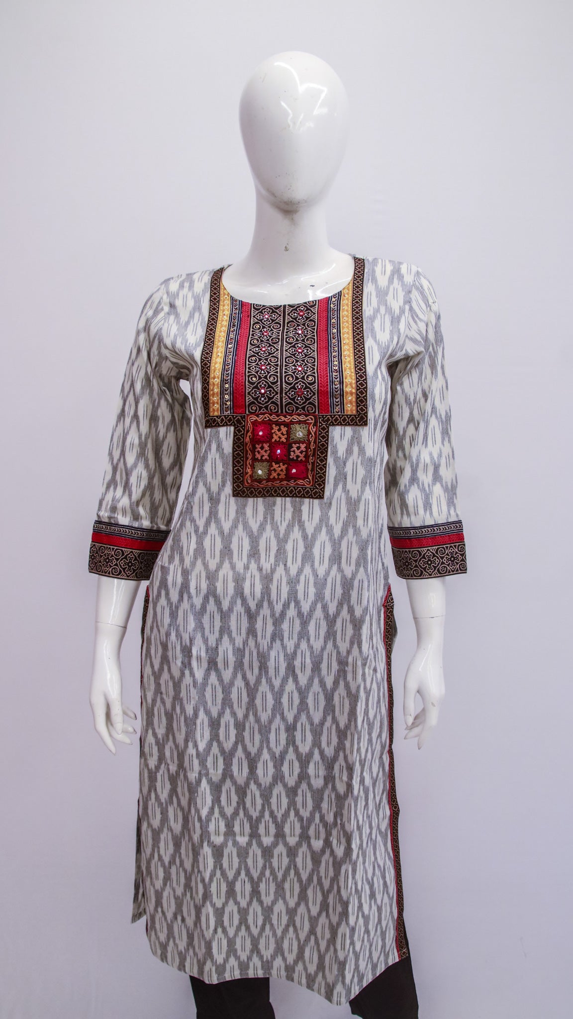 Gray patterned kurta with embroidered top on a mannequin against a white background