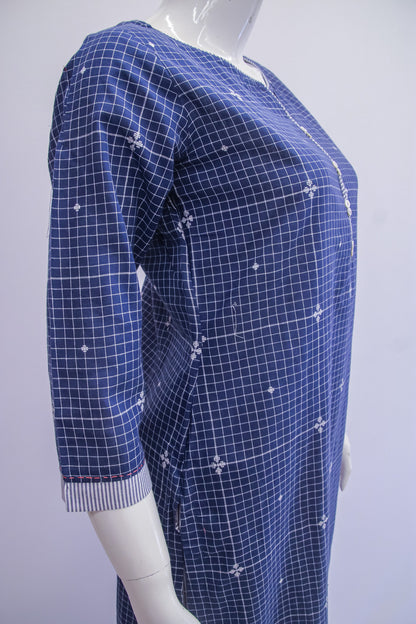 Mannequin wearing a blue grid-patterned dress on a white background