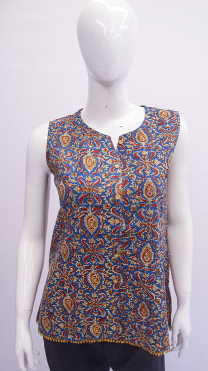 Mannequin wearing a sleeveless patterned top on a white background