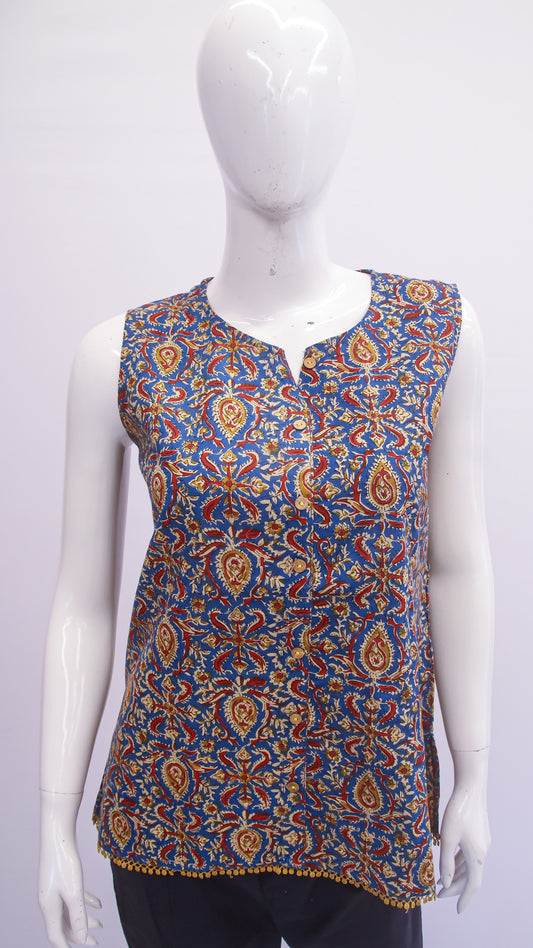 Mannequin wearing a sleeveless patterned top on a white background