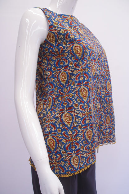 Mannequin wearing a colorful patterned top on a white background