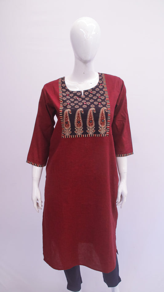Maroon kurta with intricate embroidery on a mannequin against a white background