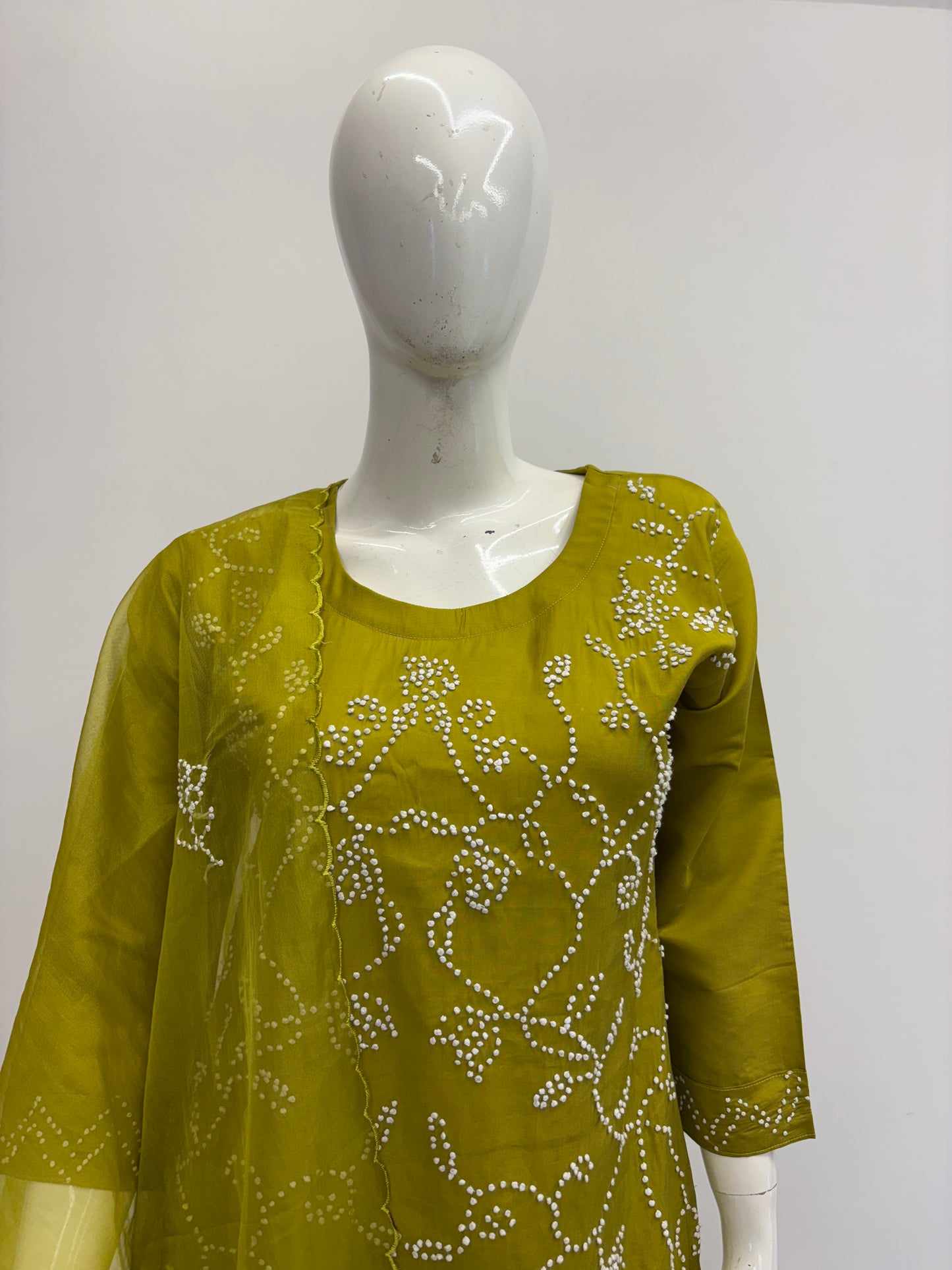 Muslin Silk Mustard Dupatta Set with Olive Green Kurta

Straight Muslin Silk Kurta with Round Neck Embroidery

Muslin Silk Pants with Elastic Waist and Belt – Olive Green

Semi Organza Dupatta – Muslin Silk Mustard Suit Set

Elegant Olive Green Dupatta Set for Casual & Office Wear