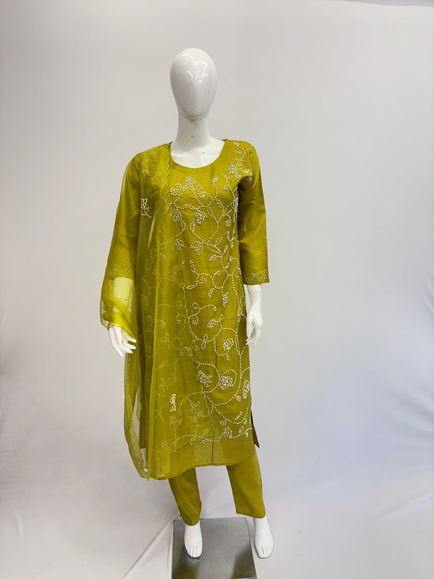 Muslin Silk Mustard Dupatta Set with Olive Green Kurta

Straight Muslin Silk Kurta with Round Neck Embroidery

Muslin Silk Pants with Elastic Waist and Belt – Olive Green

Semi Organza Dupatta – Muslin Silk Mustard Suit Set

Elegant Olive Green Dupatta Set for Casual & Office Wear