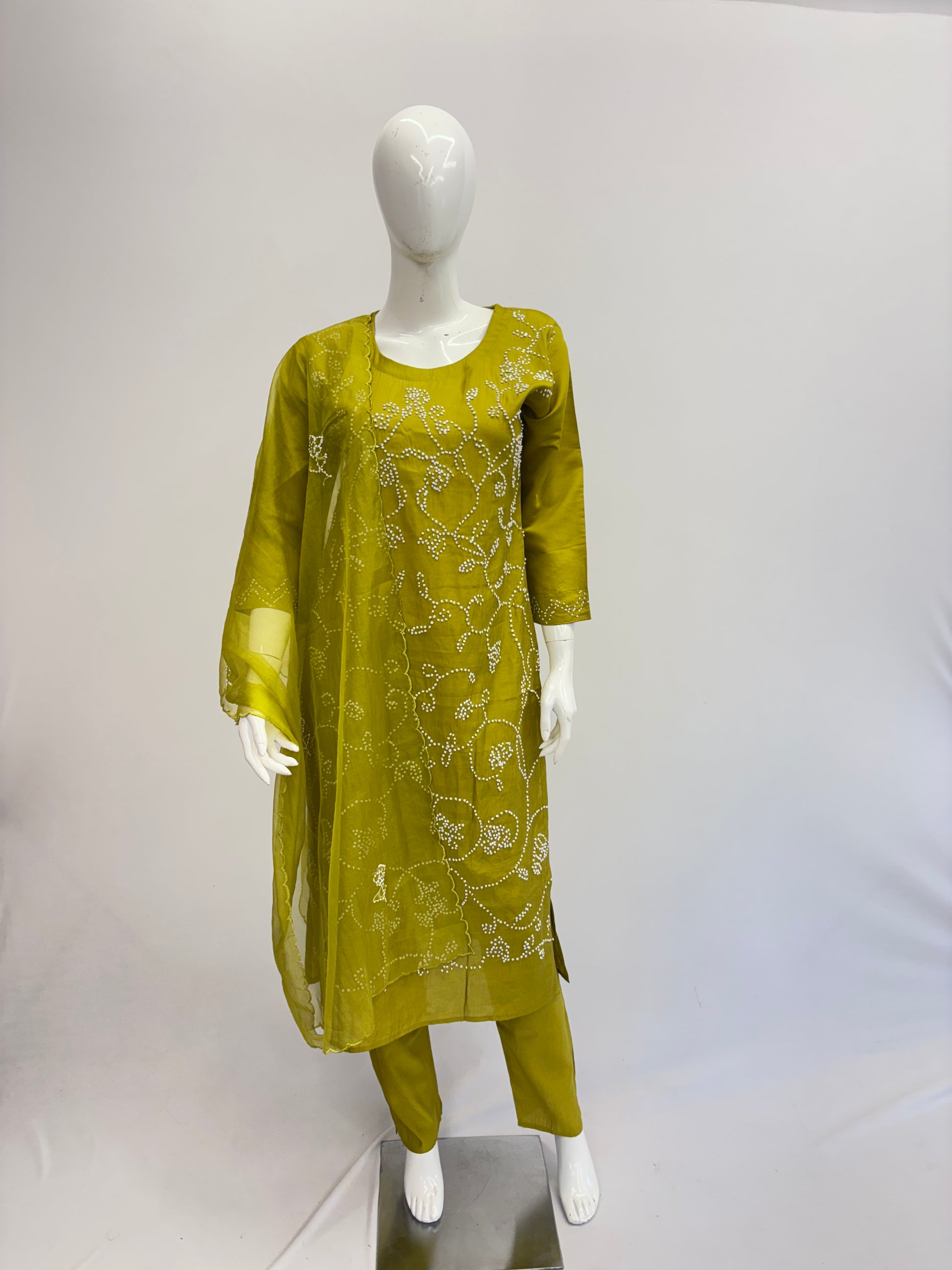 Muslin Silk Mustard Dupatta Set with Olive Green Kurta

Straight Muslin Silk Kurta with Round Neck Embroidery

Muslin Silk Pants with Elastic Waist and Belt – Olive Green

Semi Organza Dupatta – Muslin Silk Mustard Suit Set

Elegant Olive Green Dupatta Set for Casual & Office Wear