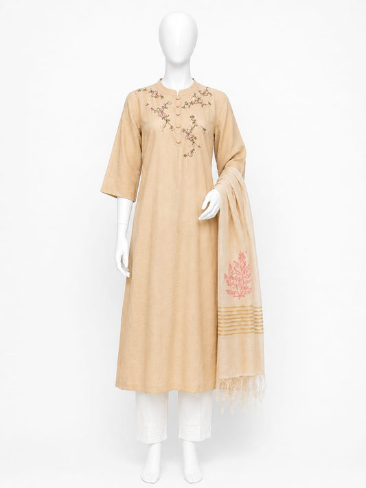Beige dress with floral embroidery on a mannequin against a white background