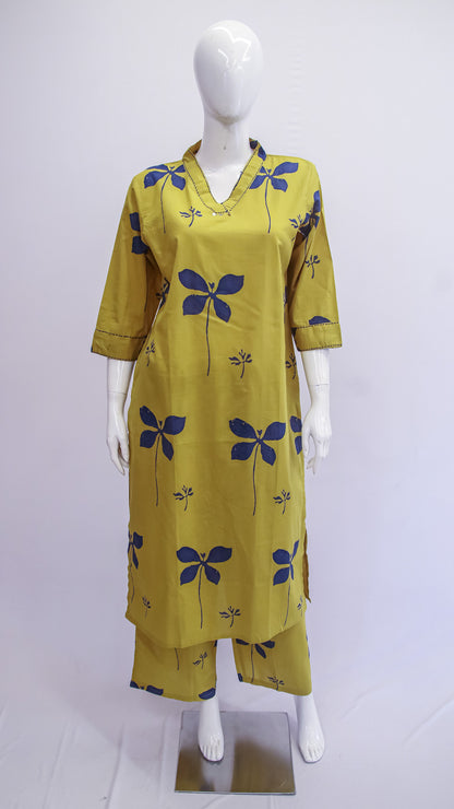 Yellow kurta with blue floral patterns on a mannequin against a white background