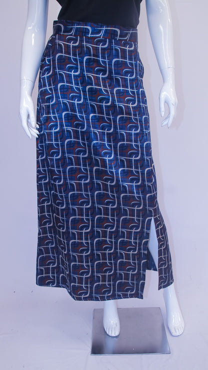 Mannequin wearing a blue patterned skirt on a plain background