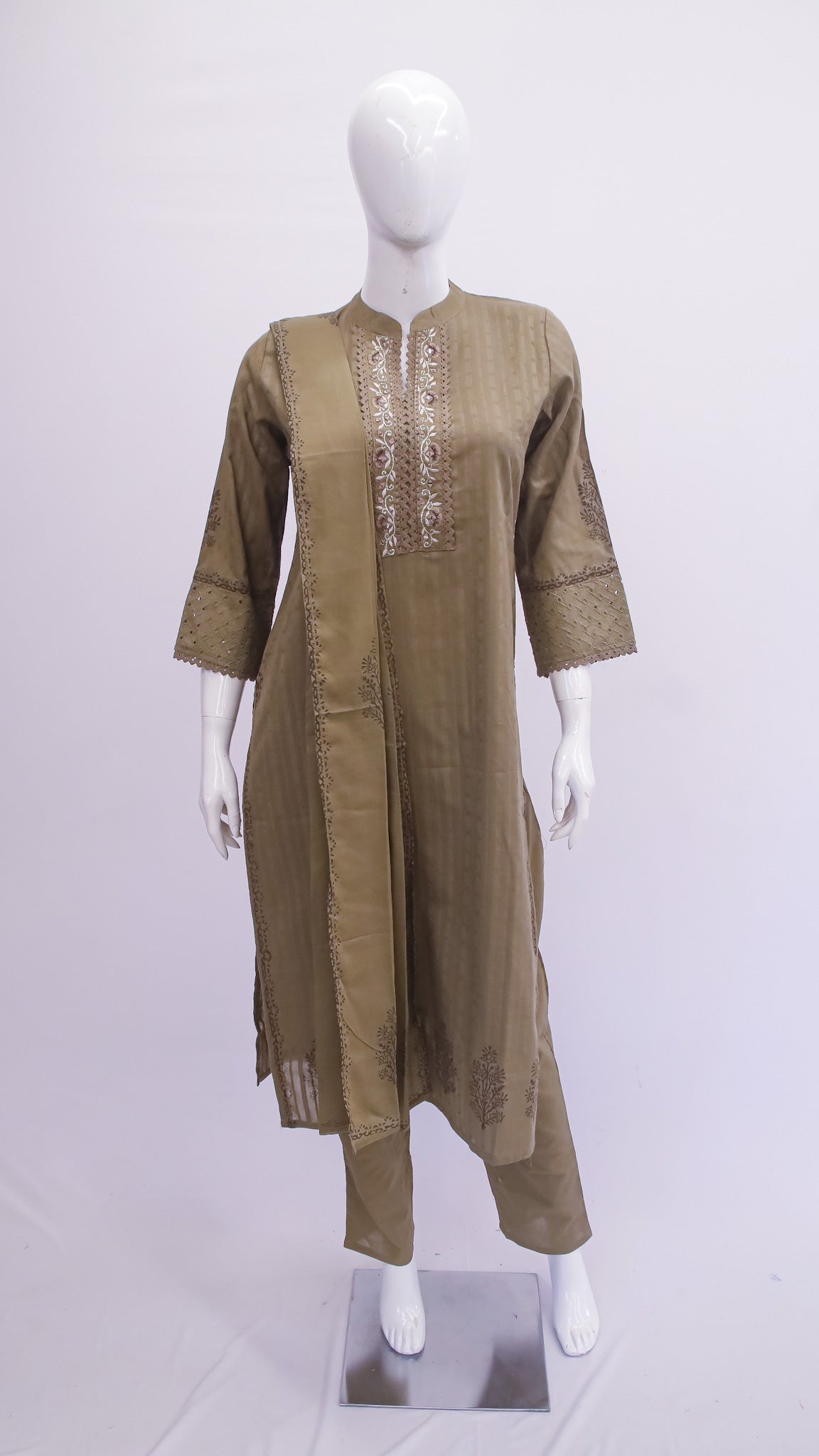 Brown kurta with white embroidery on a mannequin against a white background