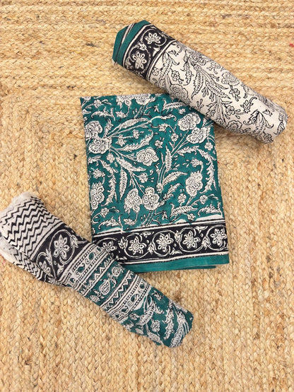 Premium Cotton Teal Green Floral Printed Unstitched Dress Material with Matching Cotton Bottom and Printed Dupatta by Udojas Sutra.