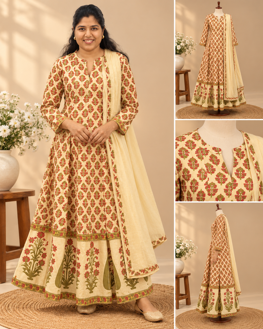 Cream floral printed Anarkali set with rust-red and olive-green motifs, flared silhouette, matching bottoms and cream dupatta.