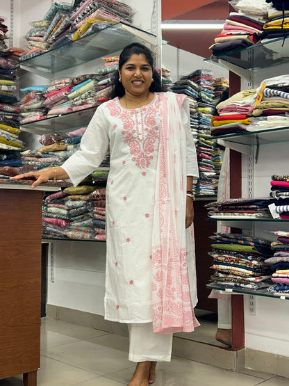 White Mul Cotton Chikankari kurta pant set with pink floral embroidery and matching printed dupatta