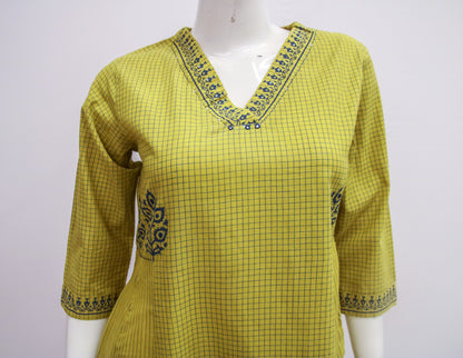 Yellow checkered kurta with embroidery on a white background